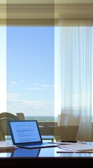 Poster - A laptop computer sits on a desk in front of a window with a view of a blue sky and green trees.