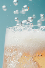 Wall Mural - sparkling cream soda with foam and bubbles creates refreshing and vibrant drink experience. efferves