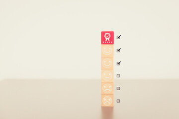 Fototapete - Wooden block quality standards with customer service smile face icon for best excellent satisfaction survey feedback or finance digital marketing poll or product review concepts.