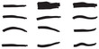 © TinyStock Studio - Collection of black brushstrokes and circles on a white background.