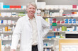 © peopleimages.com - Happy man, pharmacist and portrait in pharmacy for healthcare, friendly welcome and service. Mature chemist, smile and confident in drugstore for medicine dispensary, assistance and support in Canada