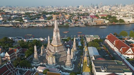 Wall Mural - Aeriail view temple of dawn Wat Arun pagoda with Chaophraya river and building Bangkok Thailand