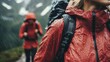© anatolii - Hikers navigating a rainy trail in the mountains while wearing waterproof jackets during an adventurous outdoor excursion in nature