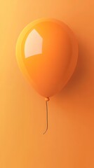 Bright Orange Balloon Against a Smooth Orange Background