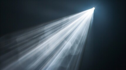 Wall Mural - a striking image with a white light on a black background creating depth and mystery through contras