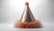 © fotoluigi868 - Fluffy party hat sits alone on white background looking festive and fun. _1(229)
