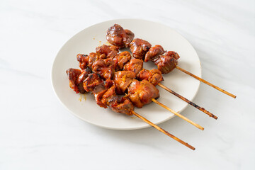 Wall Mural - grilled chicken gizzard skewer yakitori serve in izakaya style