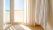 © KayKai - A window with a white curtain is open, letting in the sunlight
