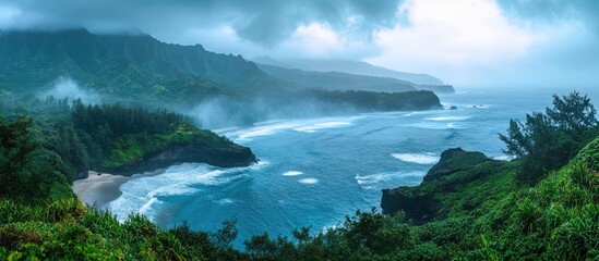 Wall Mural - Lush green cliffs overlook a turquoise ocean with white waves crashing on the shore under a cloudy sky.