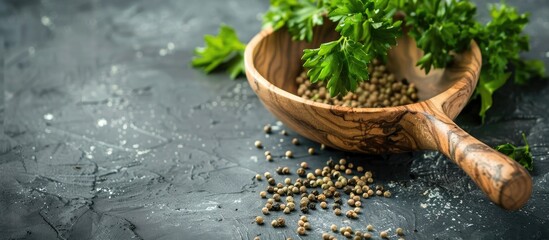Leinwandbilder - Parsley seeds in a wooden ladle. with copy space image. Place for adding text or design