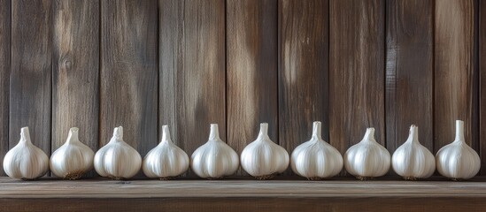 Aufkleber - Garlic is arranged in a line on a rustic wooden backdrop Copy empty space for text