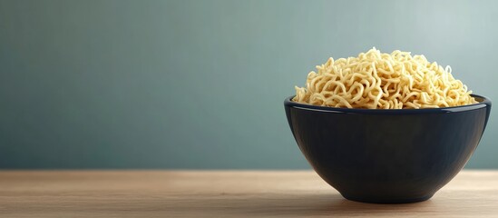 Leinwandbilder - Instant Noodles in a Bowl on a Table. with copy space image. Place for adding text or design