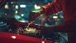 © Tri - A mechanic working on a car engine in a dimly lit garage.