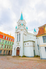 Wall Mural - Old street in old Riga. The city is capital of Latvia that is well known to be a very popular tourism destination in the Baltic region