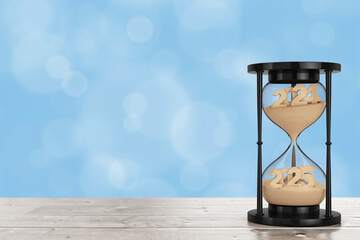 Aufkleber - New 2025 Year Concept. Sand Falling in Hourglass Taking the Shape from 2024 to 2025 year. 3d Rendering