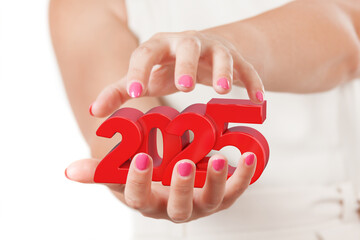 Poster - Two Woman Hands Protecting 2025 New Year Sign.