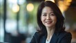 © WS Studio 1985 - Professional Asian Businesswoman in Modern Office Setting