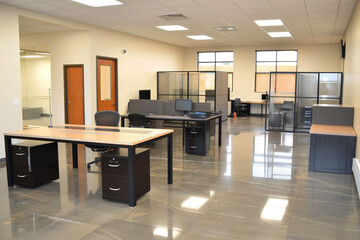 Wall Mural - modern office with a neutral color palette, simple black tables, glass dividers, and a spacious layo