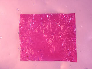 Wall Mural - pink plastic texture for a colorful background.