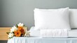 © lnwAI - Hospital bed in a private maternity room with fresh flowers by the bedside