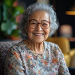 © urbanpalette - Elderly Woman with a Bright Smile: Joyfully Engaged in Work, Radiating Positivity and Energy