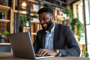 A business professional reviewing their employee benefits online showcasing a companys commitment to offering attractive employee benefits