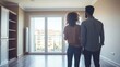 © atipong - A young couple touring a rental apartment showcasing affordable and convenient living options for tenants