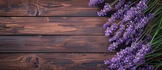 Poster - Bouquets of lavender on a wooden tabletop seen from above. with copy space image. Place for adding text or design