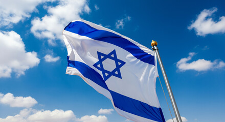 Flag of Israel waving against blue sky showcasing national symbol and cultural identity