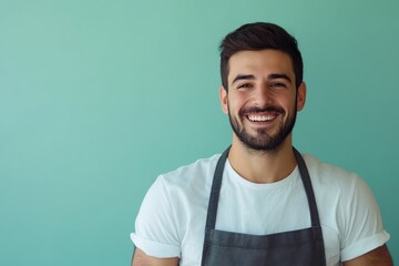 Young male cooker wearing in apron