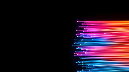Poster - Close up shot of bright colorful fiber optic threads emitting vibrant light set against a high contrast black background creating a visually striking and dynamic abstract scene
