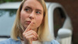 © Yuliia - Pensive Caucasian businesswoman puzzled female driver dream lady portrait woman girl thinking about buying new automobile car buyer pondering transport decision in city wonder auto rent credit problem