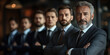 © ivanko80 - Confident Business Team Standing Together in a Modern Office