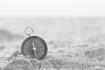 Wall Mural - classic navigation compass on natural background