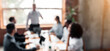 © Prostock-studio - Corporate Meeting, Blurred Business Background. Unrecognizable Businessman Giving Speech To Employees In Modern Office.