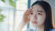 © LU - Health care concept, eye problem asian young woman applying, using medical eye drops to treat dry eye and irritation, suffering from irritated eye dry eyes or inflammation, allergy optical symptom.