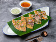 © Scopio - Indian food slice on green banana leaf