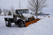 © KAT - unimog snow plow removing snow from a driveway after a blizzard in Cheyenne wyoming