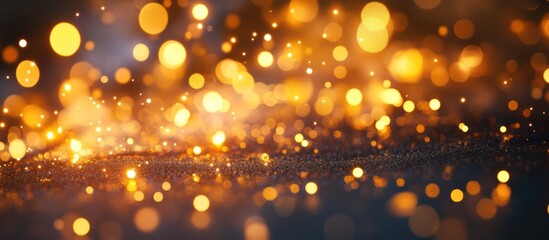 Wall Mural - Abstract bokeh background with warm, golden light and sparkles.