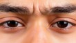 © Mind - Close-up of intense human eyes conveying emotion and expression on a white isolated background.