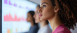 © Marketplace - A focused young woman analyzing data on a digital screen, showcasing a modern workplace environment dedicated to performance and teamwork.