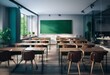 © YiuCheung - Empty classroom with wooden desks and chairs, green chalkboard, and large window.