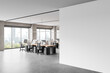 © ImageFlow - Light coworking interior with pc computers in row, panoramic window. Mockup wall