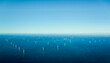 © Westend61 - Windfarm in dutch part of North Sea under blue sky