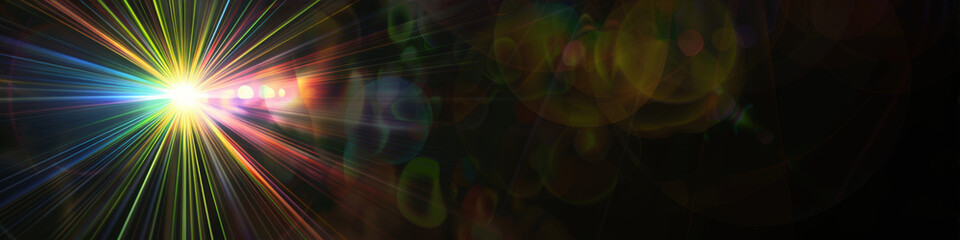 Canvas Print - Bright, multi-colored rays on a black background. Abstract background for banner.

