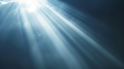 Wall Mural - a radiant sun shines in a dark blue sky, casting hopeful rays. a peaceful scene with a white cloud c