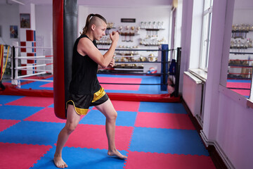 Young boxer shadow boxing