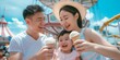 © Valery - Happy asian family, mother, father and daughter eating ice cream together