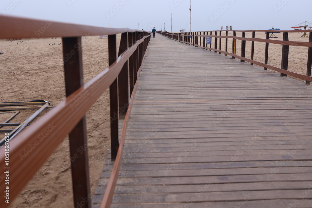 Boardwalk wooden pathway at marina beach in Chennai. a ramp for ...