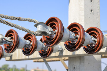 High voltage post, High voltage tower, show with high voltage construction and power lines.